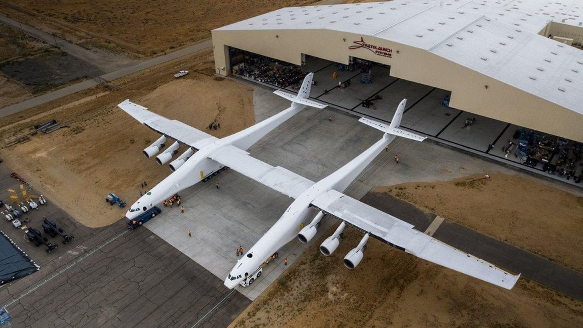 Самая массовая модель самолета. Самый большой самолет в мире Stratolaunch. Самолет Stratolaunch model 351. Самолет scaled Composites Stratolaunch model 351. Двухфюзеляжный самолет Stratolaunch.